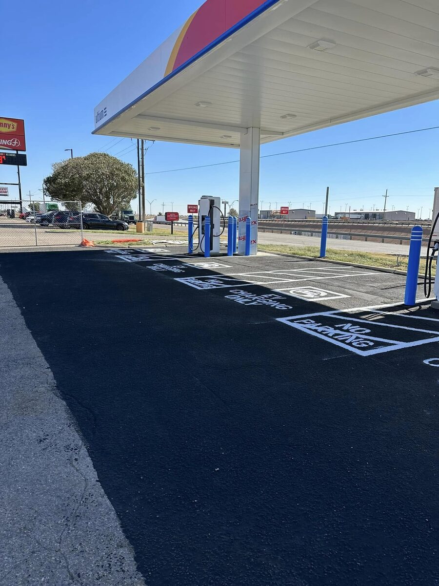 Newly striped parking area with EV charging markings