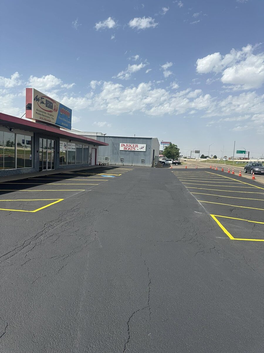 Freshly sealcoated and striped commercial parking lot